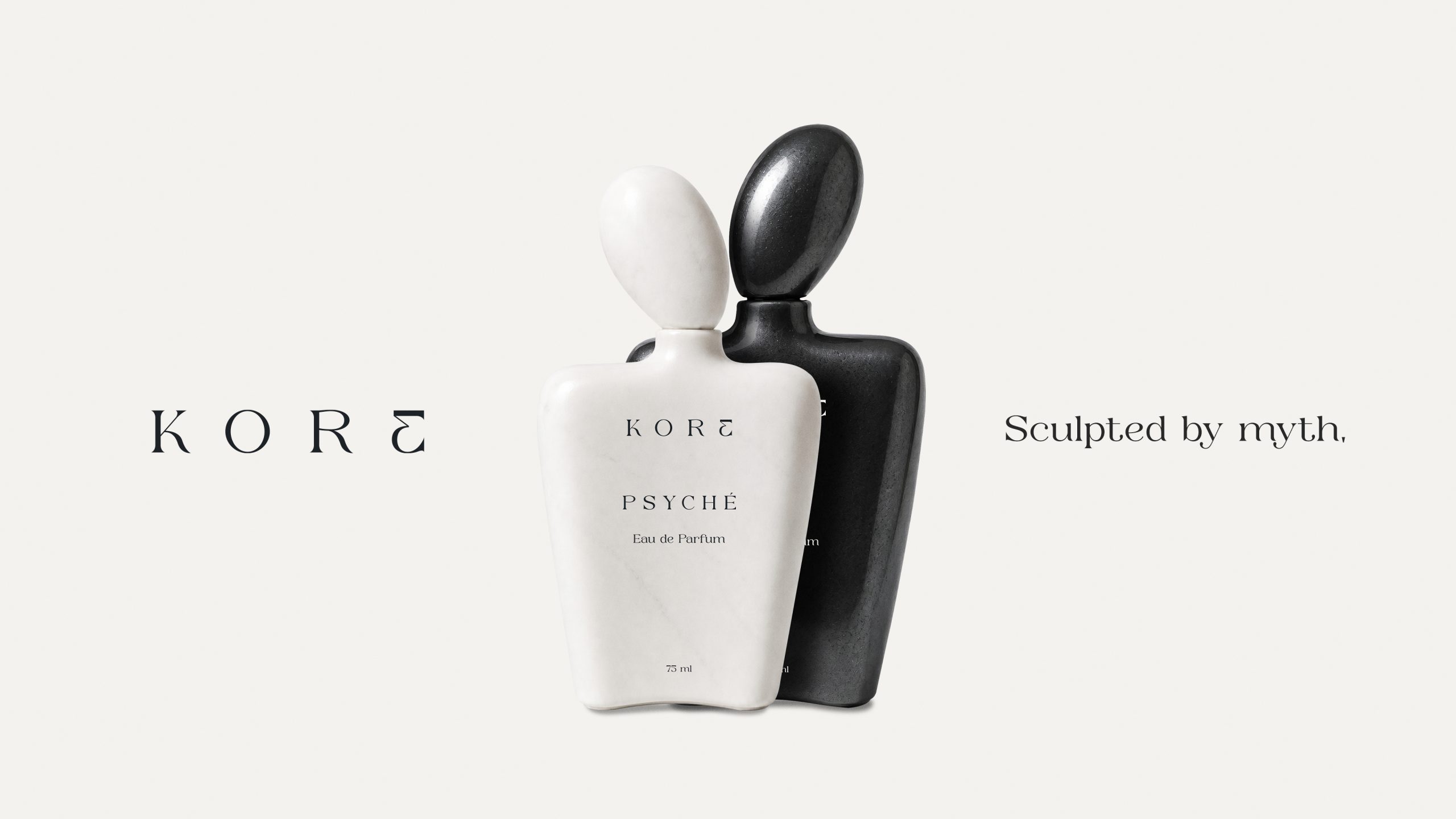 Packshot des parfums Eros et Psyché de la marque KORE présentant les deux flacons sculpturaux en marbre blanc et hématite noire.