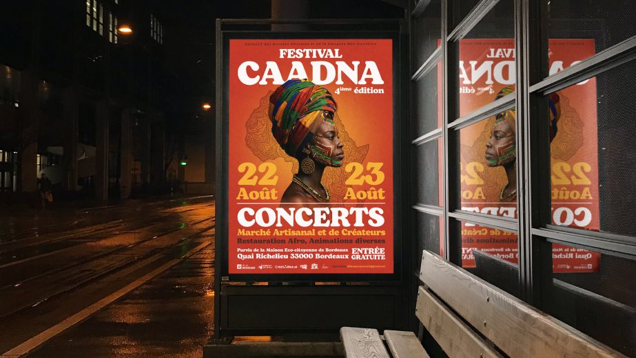 Identité visuelle festival CAADNA avec affiche événementielle diffusée sur un abribus à Bordeaux pour promouvoir un festival culturel afro et musical