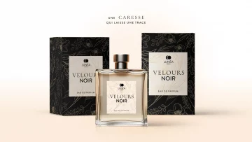 Mise en situation de direction artistique pour la marque de parfum Velours Noir, associant packaging premium et univers graphique luxueux.